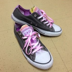 Gray Converse with multi-colored tongue