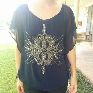 Beautifully beaded dark blue blouse.