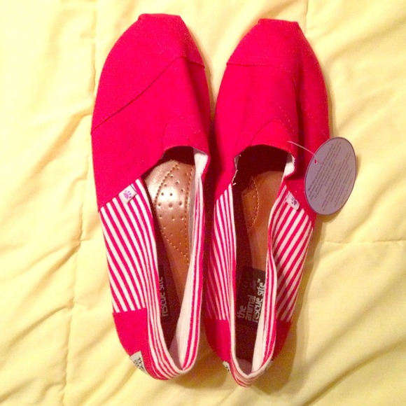 Red and white canvas shoes
