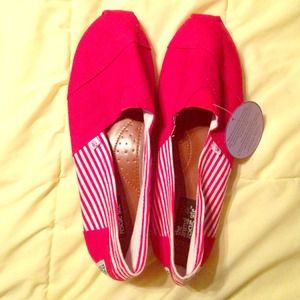 Red and white canvas shoes