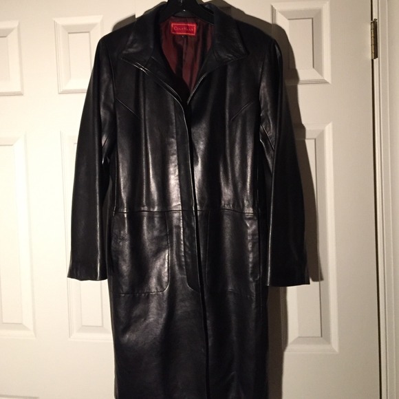 Slightly worn Cole Haan mid length leather coat.