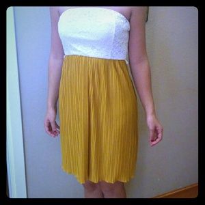 Cute mustard colored accordion and lace dress