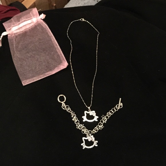 rhinestone hello kitty necklace and bracelet.