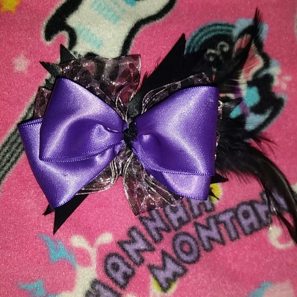 Purple cheetah hair bow with feather
