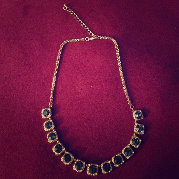 Montana blue gem color with Gold plated chain.
