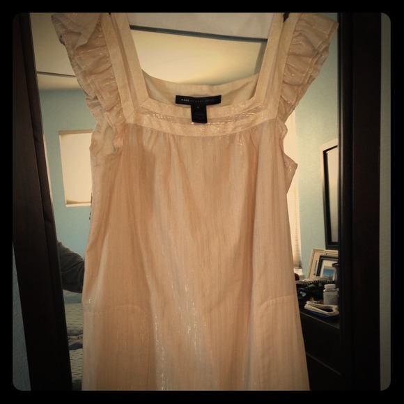 Beige dress with gold accents