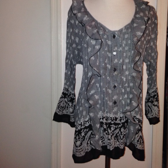Black and white flowered shirt.