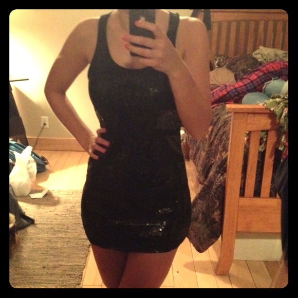 Black sequin dress and or long tank.