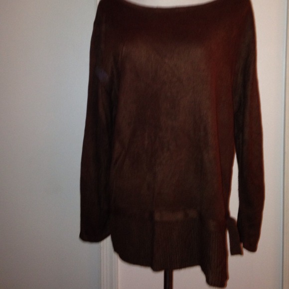Brown sweater with tie on the side.