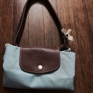 Longchamp light blue. Pre-owned with some stains