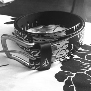 Black & white leather volcom belt