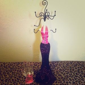 A ring holder and necklace holder