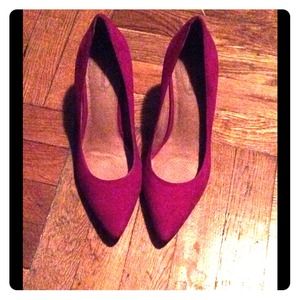 Soft suede  almond-toe pump set on a slim heel.