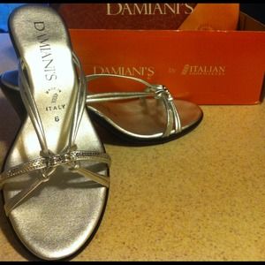 Damiani's silver and black heels