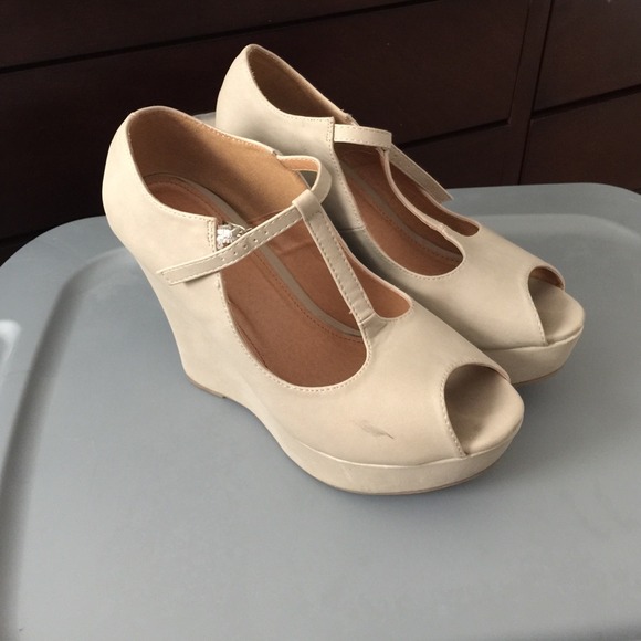 Nude wedges.