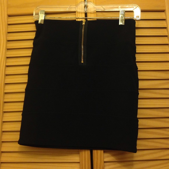 Topshop mini skirt.  Size 6 but it's closer to a 4