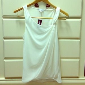 white sleeveless goddess top with chiffon overlay