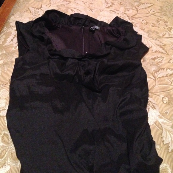 Black Xscape woman's dress by Joanna Chen.
