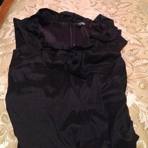 Black Xscape woman's dress by Joanna Chen.