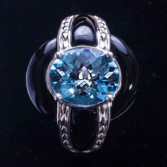 Blue topaz and onyx silver ring