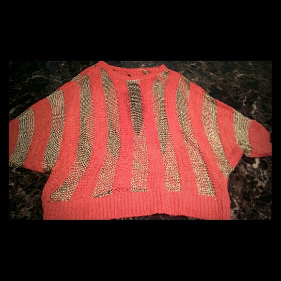 Batwing XL coral/gold open oval in the back.