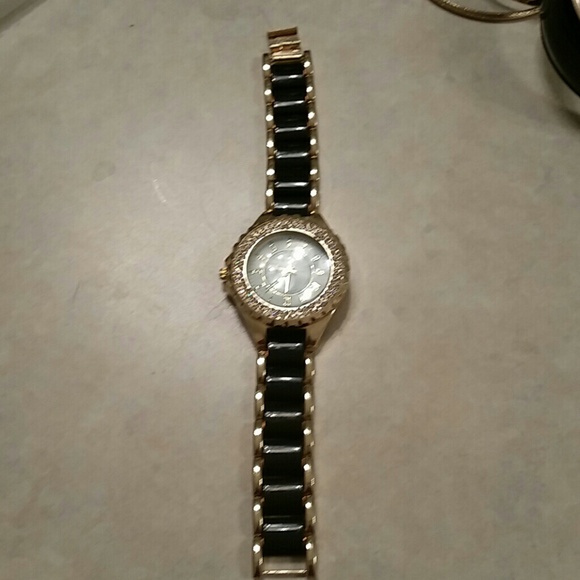 Black and Gold tone watch with Rhinestones