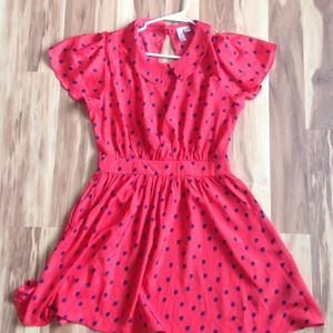 Red dress with navy blue polka dots