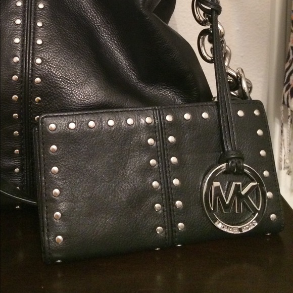 Michael Kors Black bag and wallet set.