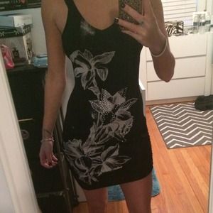 A black dress with hawaiian flowers