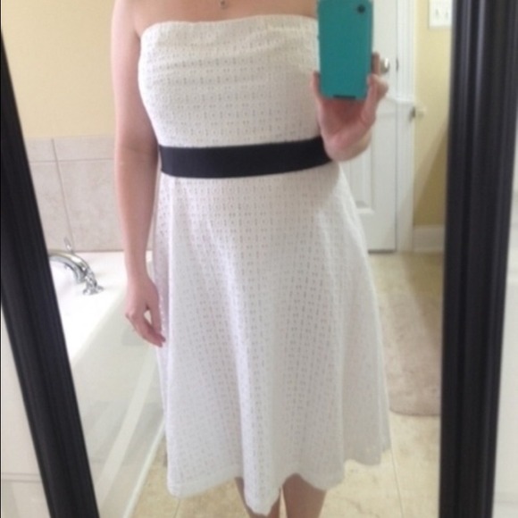 White strapless dress with black sash