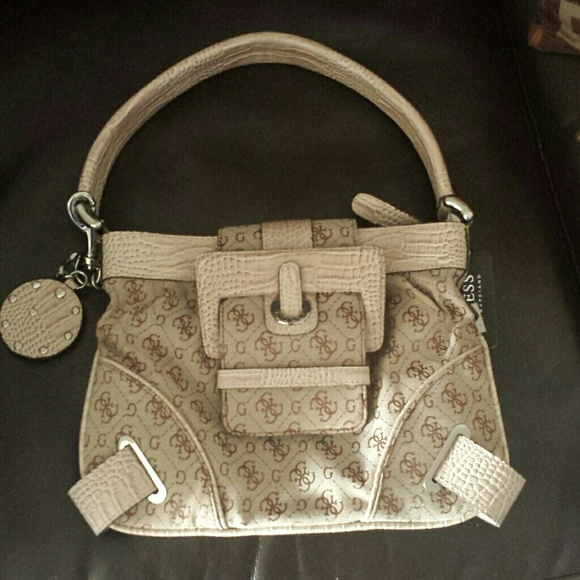 Small Guess handbag w/ Hydraulic  Jacket
