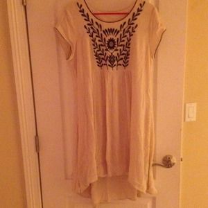 Beige hi-low dress with floral design