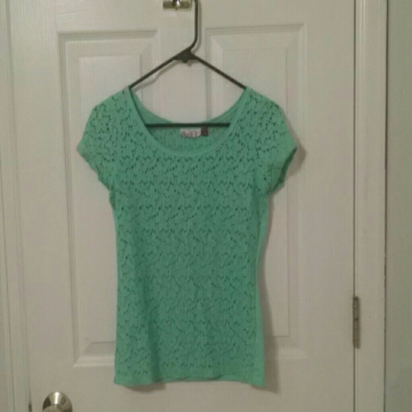 mint green shirt