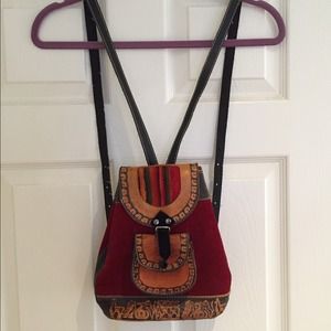 Small red suede backpack