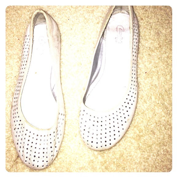 pearl colored flats with shine at the top