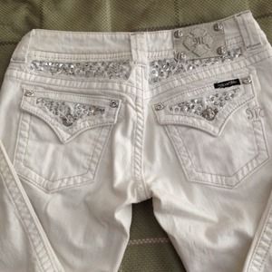 White denim Miss Me jeans.