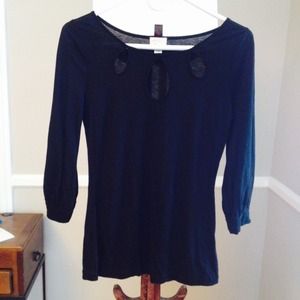 Peekaboo black Anthropologie black shirt.