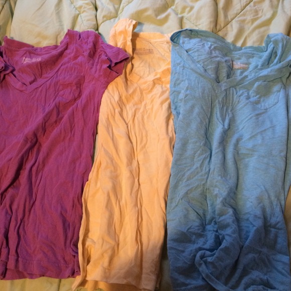 Purple, yellow and blue v-neck shirts