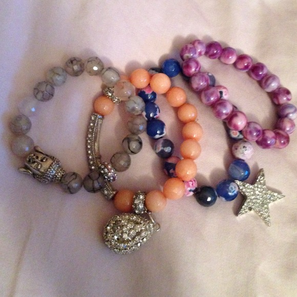 Beaded bracelets with hanging charms
