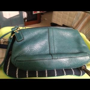 Turquoise wristlet from coach