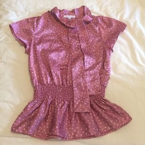 Beautiful blouse with neck tie.