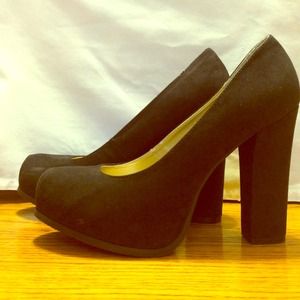 Black suede pumps
