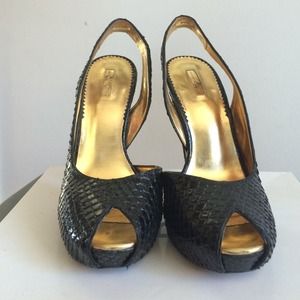 Report Signature Black faux Snakeskin heels