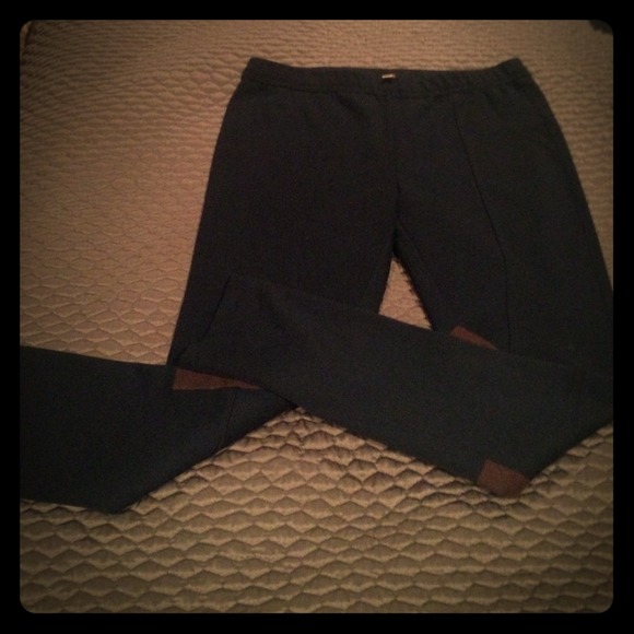 Navy jeggings with brown patch in inner thigh