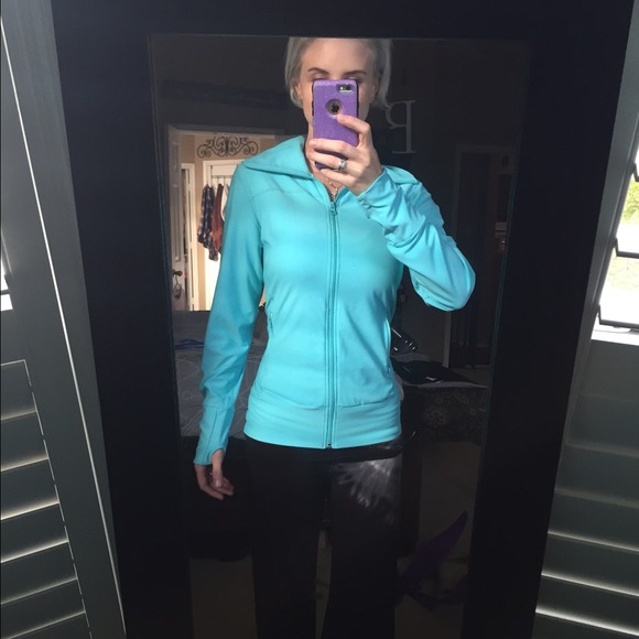 Turquoise athletic jacket.