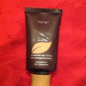 Tarte Amazonian clay foundation in light sand.