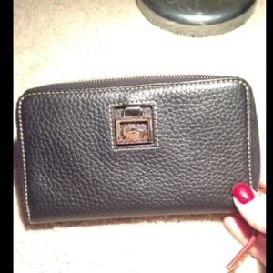 Black pebble leather Dooney wallet