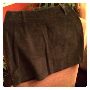 Black corduroy mini skirt.