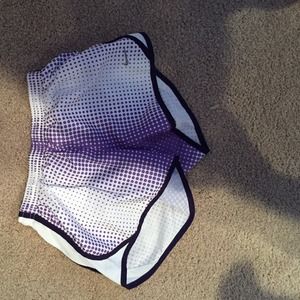 purple and white nike shorts