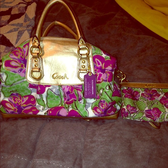 Authentic Coach Flower purse with makeup bag.